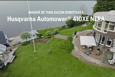 Husqvarna Automower® 410XE NERA cu tehnologie fără cablu de perimetru.